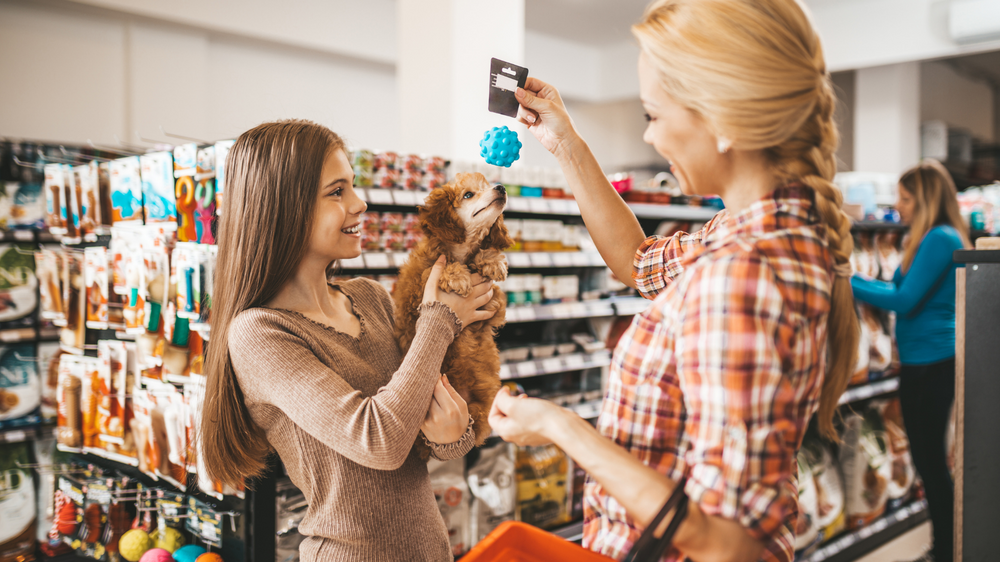 People shopping in a pet store